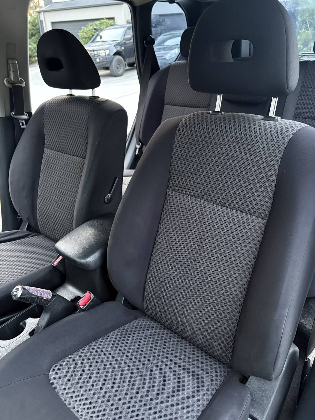 Cloth front seat after detailing — stains lifted and fabric refreshed