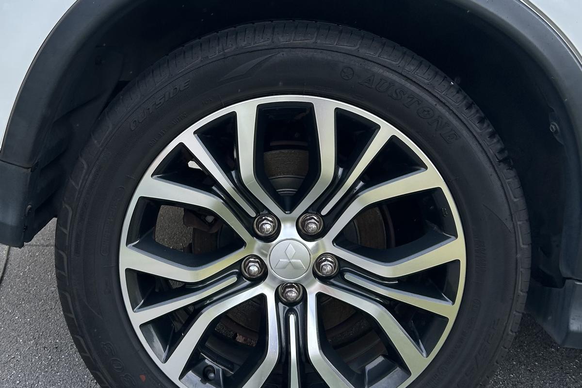 Alloy wheel and tyre cleaned and dressed during an exterior detail